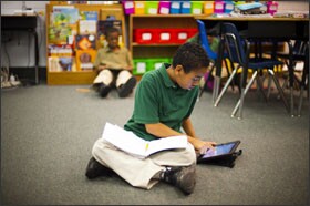 Daniel Morgan, 11, works on math at the Intergenerational School in Cleveland. The common core is driving charter schools to examine their curricula.
