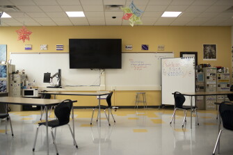 Most classrooms at East High School have large television displays connected to teacher workstations.