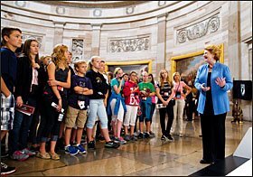 U.S. Sen. Debbie Stabenow, D-Mich., leads a tour group of students from St. Patrick School of White Lake, Mich., in the Rotunda on Capitol Hill in Washington last week. Congressional staffers and interns usually lead constituent tours, but because of the federal government shutdown, members of Congress have begun to lead tour groups from their home states.
