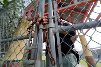 The Scottsbluff section had signs in the seats for their game against Omaha Roncalli during a Class B game of the Nebraska state boys high school basketball tournament at Pinnacle Bank Arena in Lincoln on March 13, 2020. Crowds were limited to staff and immediate family only due to fears about the coronavirus.