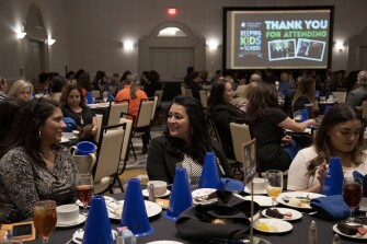 Manuela Haberer, center, principal at Boone Elementary School, talks with Norma Farrell, left, principal of Colonies North Elementary, at the conclusion of the Communities In Schools of San Antonio’s Keeping Kids In School Luncheon at the Westin San Antonio North in San Antonio, Texas on Thursday, May 19, 2022. At right is Salma Cuellar, the Communities in Schools site coordinator for Boone Elementary.