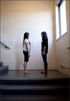 Admission Possible coach, Victoria Dutcher, 23, right, is helping See Yang, 17, a senior at Harding Senior High School navigate the complicated college admissions process. Photographed at the Admission Possible office in St. Paul, Minn.