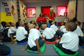 First graders look up at the ceiling during "Play Power," a program sponsored by the Louisiana Children's Museum.
