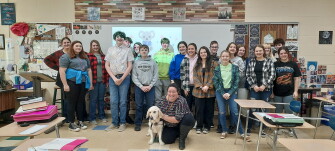 Student canine handlers receive a three-year tMHFA certification. Here they're pictured with OSU extension educators Bridget Britton and Kiersten Heckle on Dec. 9, 2022.