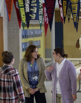 East Allegheny High School Guidance Counselor Emilia Peiffer, center, talks to East Allegheny seniors Savannah Crooks, left 18, and Shayna Smith, 17.