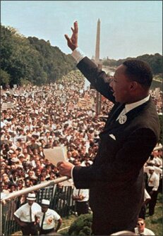Martin Luther King Jr. acknowledges the crowd at the Lincoln Memorial for his “I Have a Dream” speech during the March on Washington on Aug. 28, 1963.