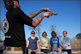 Teachers and other staff members from the Clifton, Texas, school district undergo handgun training at a shooting range just outside of Clifton. Instructors from Big Iron Concealed Handgun Training in Waco, Texas, were giving teachers tips on what they need to know to earn a license to carry weapons out of sight. The district has not yet decided, though, whether to permit its employees to carry guns in school.