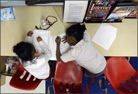 Students work in a classroom at John Eager Howard Elementary School in Baltimore.