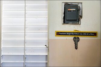A sign of encouragement hangs under an electrical box at Marta Lafontaine school, which has been without power since Hurricane Maria.