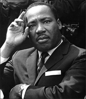 Martin Luther King Jr. gives a news conference in 1963 in Birmingham, Ala., announcing he and other black leaders have called for federal Army occupation of Birmingham in the wake of a church bombing and shootings which left six black people dead.
