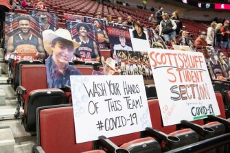 The Scottsbluff section had signs in the seats for their game against Omaha Roncalli during a Class B game of the Nebraska state boys high school basketball tournament at Pinnacle Bank Arena in Lincoln on March 13, 2020. Crowds were limited to staff and immediate family only due to fears about the coronavirus.