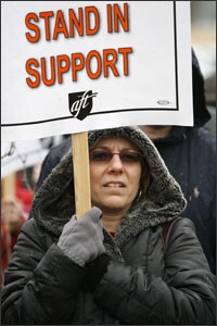 Sandy Capelli, a West Warwick, R.I., teacher attends a rally to support the Central Falls High School teachers who may be fired at the end of the school year on March 4 in West Warwick, R.I.