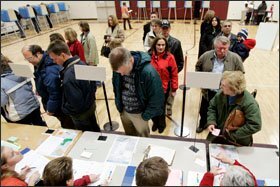 Voters pick up their ballots at Fox Valley Lutheran High School in Appleton, Wis., during the presidential primary election on Feb. 19. Although public schools are often used as polling places, private schools, churches, and other facilities are also pressed into service.