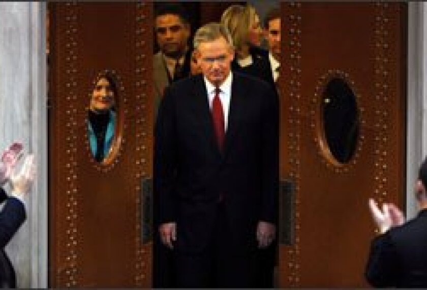 The doors of the Missouri House of Representatives chamber open as Gov. Jay Nixon is introduced before his first State of the State address, which he delivered Jan. 27. Gov. Nixon, a Democrat, said he intends to fully fund planned spending increases for education, despite the state’s budget troubles.