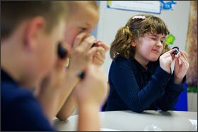 Maguire Duncan uses a small magnifying glass to inspect rock samples in her 2nd grade class at the STEM-focused school. Nationwide, there are 785 rural charter schools, accounting for just 16 percent of the total number of charters in the United States.