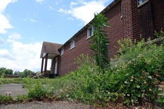 The Hughes, Ark. school district consolidated with the West Memphis school system in 2015. Now, the Hughes High School buildings sit closed, vacant, and in disrepair.