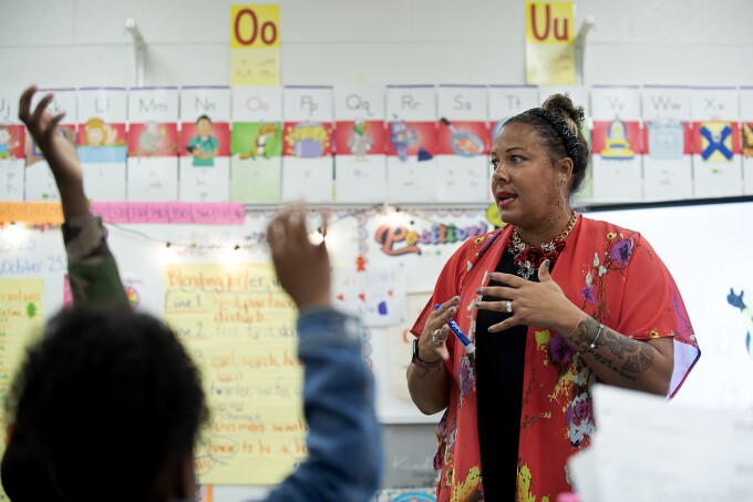 Jacqueline Chaney ask her 2nd graders a question during class at New Town Elementary School in Owings Mills, Md., on Oct. 25, 2023.
