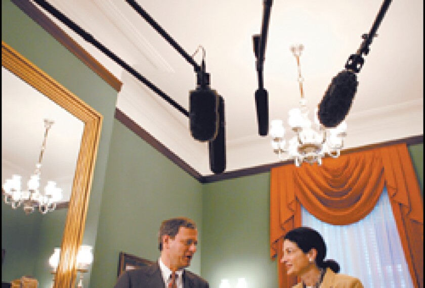 Supreme Court nominee John G. Roberts Jr. meets Senator Olympia Snowe, R-Maine, during a July 27 visit to Capitol Hill.