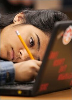 Menna Meyyappan, a 10th grader at the Lake Washington school district’s STEM High School, draws a diagram during a programming class in Redmond, Wash. “I visualize what I need to program to make my frame playable,” she says.
