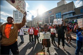 Educators, parents, students, and community and labor groups rally outside the School District of Philadelphia headquarters earlier this month to protest a move by district officials that would require members of the Philadelphia Federation of Teachers to pay some health-insurance costs. Crippled by deep budget cuts, the city’s School Reform Commission says the action is necessary to send much-needed resources to schools.