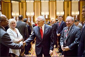 Gov. Nathan Deal, a Republican, shakes hands as he leaves the House floor after delivering the State of the State address in Atlanta. Deal is asking Georgia lawmakers to support a new plan for fixing low-performing schools after voters last fall rejected a proposal for state takeovers of schools that consistently struggle.