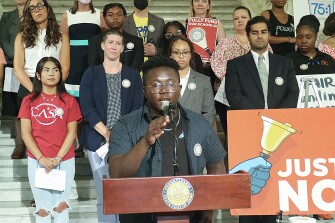Paul Vandy speaks at a rally for improved school funding outside the state legislature building in Harrisburg, Pa., on July 26, 2022.