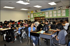 Students at Corona-Norco Unified’s Louis VanderMolen Fundamental Elementary use laptops for daily reading instruction as well as to prepare for the state’s new computerized testing.