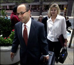 Plaintiffs' lawyer Eric Rothschild and plaintiff Tammy Kitzmiller enter the U.S. District courthouse in Harrisburg, Pa., on Sept. 26, the first day of a civil trial challenging the constitutionality of the Dover Area School Board's incorporation of "intelligent design" material into its 9th-grade science curriculum.