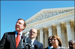Jerry D. Weast, left, the superintendent of the Montgomery County, Md., school district, answers questions outside the U.S. Supreme Court on Oct. 5 after oral arguments in Schaffer v. Weast. To his left is Gregory G. Garre, who argued the case for the district.