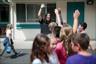 Principal Linda Irving jokes with students at Park Side Elementary School in Sebastopol, Calif. Irving faces several challenges in her district.