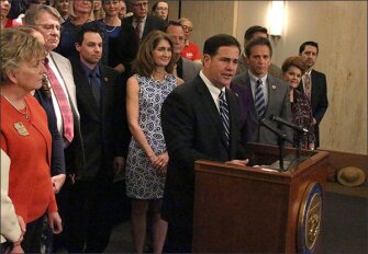 Arizona Gov. Doug Ducey announces a 9 percent pay increase for teachers in the fall that will jump to 20 percent by the 2020 school year at a press conference earlier this month.