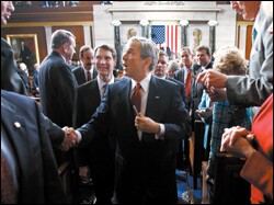 President Bush shakes hands with members of Congress after his Feb. 2 State of the Union Address, in which he cited his accountability plan for high schools.