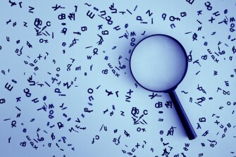 Letters and a magnifying glass.