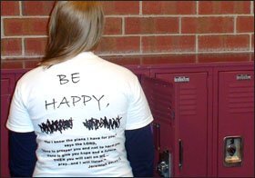 Heidi Zamecnik displays a shirt that originally said, “Be Happy, Not Gay.” Administrators at her Illinois high school told her the latter half of the slogan was offensive.