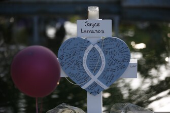 Jayce Luevanos' cross stands at a memorial site for the victims killed in this week's shooting at Robb Elementary School in Uvalde, Texas, Friday, May 27, 2022.