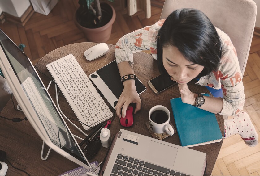 Woman working at computer.