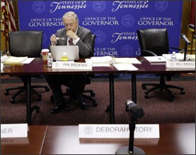 Tennessee Gov. Phil Bredesen works between sessions of a special budget hearing. Fifty-nine education department staffers took a voluntary buyout in a statewide effort led by Gov. Bredesen.