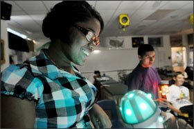 Malasha Jones, 15, of Coronado High School, uses an interactive video tool for a science class.