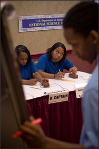 Sylvie Bizimungu, left, and Olivia Cox listen to a question during a match at the National Science Bowl, held last month at the National 4-H Youth Conference Center in Chevy Chase, Md. The all-girls team is an inspiration to other Buffalo Prep Students.