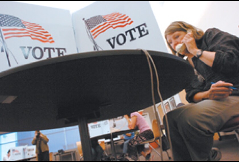 Carol Stearman joins a phone bank at the Burlingame, Calif., headquarters of the California Teachers Association, where she and other teachers called residents urging them to vote against three measures backed by Gov. Arnold Schwarzenegger in a Nov. 8 special election. The union may spend as much as $50 million to defeat the school-related measures.