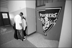 As the school day ends, Alamin walks his girlfriend, Maran Angeli Velasquez, out of school as he prepares to head off for his tutoring session.