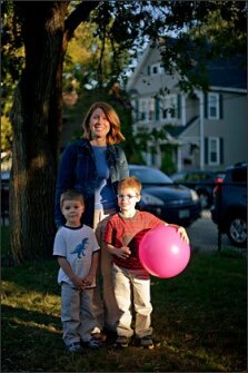 Karin Cevasco is one of the parents leading a group trying to open the Gate City Charter School for the Arts. A new state policy, however, has at least temporarily cast doubts on their efforts. She is pictured in a park in Nashua, N.H., with her children, Charlie, 6, and Jason, 4.