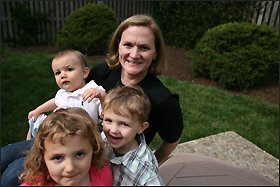 Susan Schaeffler, the executive director of KIPP DC, poses with her children Sam, Jack, and Sarah Ettinger. Each of the four schools in the District of Columbia charter school network has two vice principals to make sure someone will be ready to move into the top job.