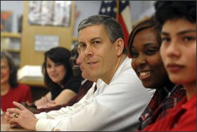 U.S. Secretary of Education Arne Duncan listens to students, teachers, and former students talk about their educational experience as he visits Robert E. Lee High School in Montgomery, Ala., on March 8.