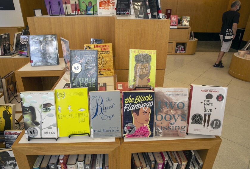 Banned books are visible at the Central Library, a branch of the Brooklyn Public Library system, in New York City on Thursday, July 7, 2022. The books are banned in several public schools and libraries in the U.S., but young people can read digital versions from anywhere through the library. The Brooklyn Public Library offers free membership to anyone in the U.S. aged 13 to 21 who wants to check out and read books digitally in response to the nationwide wave of book censorship and restrictions.