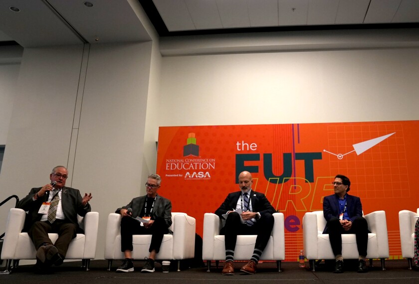 Panelists from left: Carlos Gonzalez, superintendent of the Roma Independent district in Texas; John Skretta, superintendent of Lincoln, Neb., schools; Joe Gothard, superintendent of Madison, Wis., schools; Ben Master, a senior policy researcher at the RAND Corp. speak on summer learning and student success at the National Conference on Education in Nashville, Tenn. on Feb. 13, 2026.