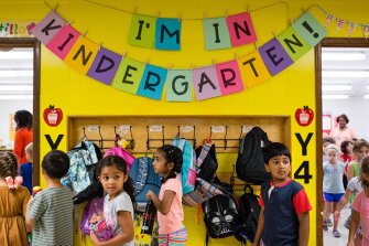 Kindergarten students at Fallsmead Elementary School in Rockville, Md., rotate among classes in their first week of school as teachers get to know them.
