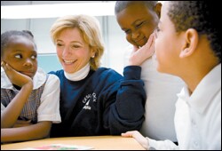 School trustee and volunteer Sue Shea works with students.