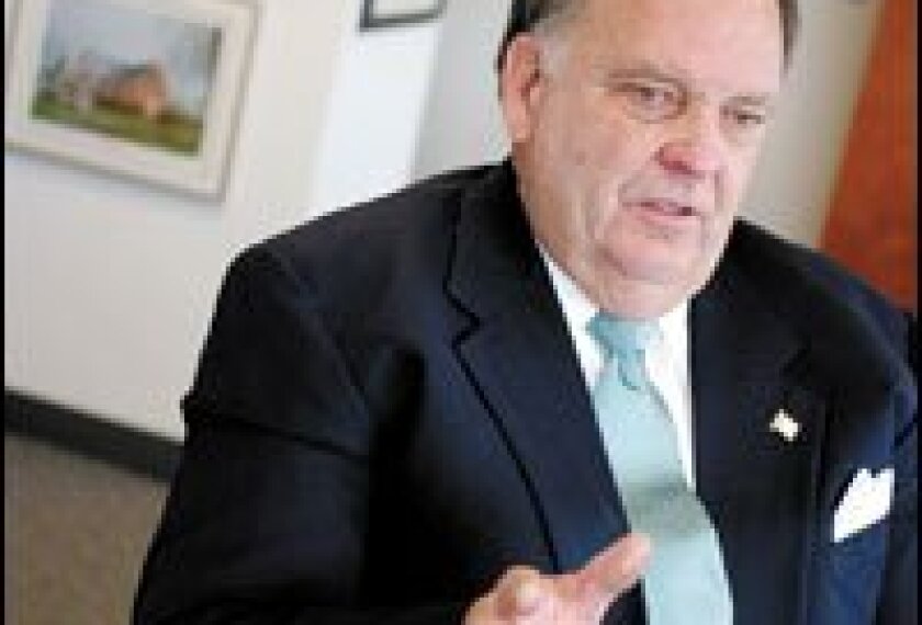 John H. Hager, the assistant secretary for special education, is sheperding rules for the revised IDEA.