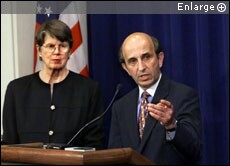 At a U.S. Justice Department news conference in 2000, then-Assistant Attorney General for Antitrust Joel Klein praises the U.S. government's case against the Microsoft Corporation as then-U.S. Attorney General Janet Reno, left, listens. Klein was the lead prosecutor in the antitrust case brought by the U.S. government and 20 U.S. states that alleged that Microsoft abused its monopoly.-J. Scott Applewhite/AP-File
